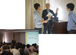 福島県立医科大学のセミナーで参加者が講師と対話している様子。背景には受講者が座っている。