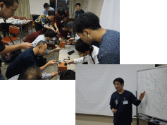 第41回福島アドバンスド・コースで心音の聴診を学ぶ参加者たちの様子。講師が説明を行い、受講生が熱心に聴診器を使っている。