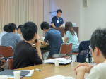 第4回診断推論セミナーで講演を行う講師と参加者たちの様子。