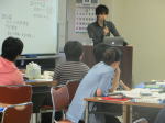 第5回診断推論セミナーで講演する講師と参加者たちの様子。
