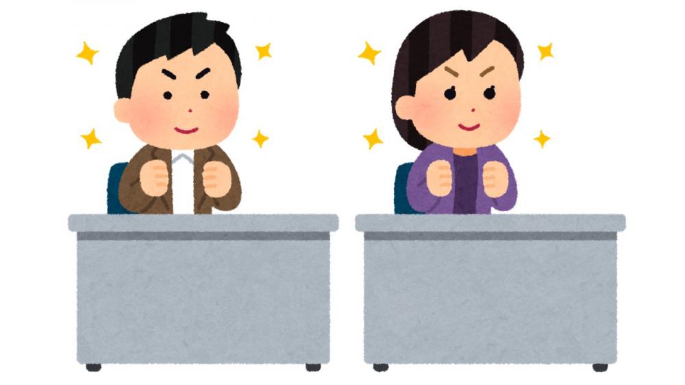 自信に満ちた表情で机に向かう男女のイラスト。互いに競い合う様子が描かれている。