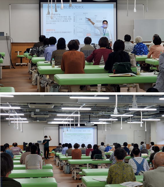 模擬患者養成講座で講師がプレゼンテーションを行い、多くの参加者が聴講している様子。