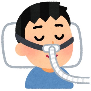 男性がCPAP（鼻ピロータイプ）を使用している
