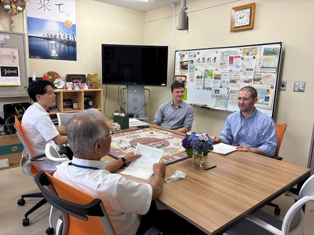 From left to right in the back: Benjamin Nikitin and George Kramer From left in front, Mahiro Matsui and GEX Executive Director Yamashita