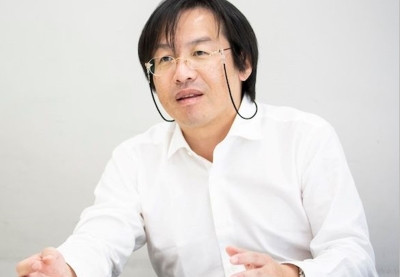 FMUスキルアップセミナーで講演する下村健寿教授の姿。