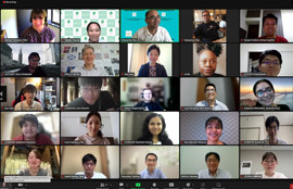 オンライン会議の画面に、多様な背景を持つ数名の大学生や医療関係者が表示されている。全員がカメラを見て微笑んでいる。