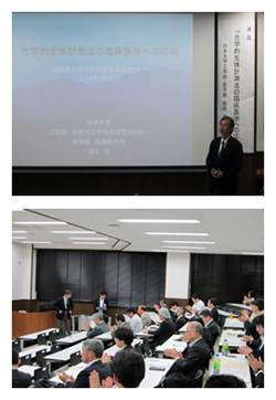 講演中の男性と集中的に聴講する聴衆