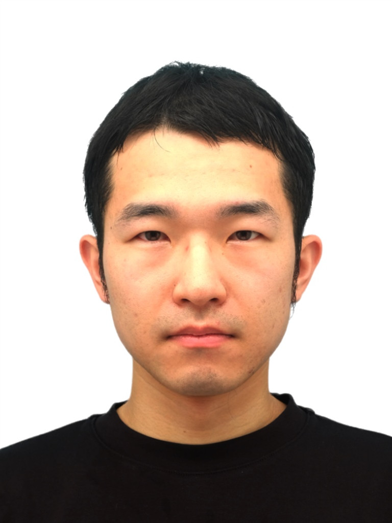 消化管外科講座の長谷川病院助手のポートレート。真面目な表情で正面を向いている。