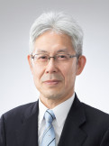 大腸癌に関する研究を行う中嶋正太郎准教授のポートレート。