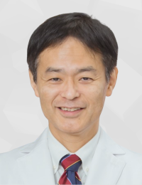 大腸癌に関する研究を行う中嶋正太郎准教授のポートレート。