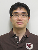 福島県立医科大学の及川雅啓助教のポートレート写真。