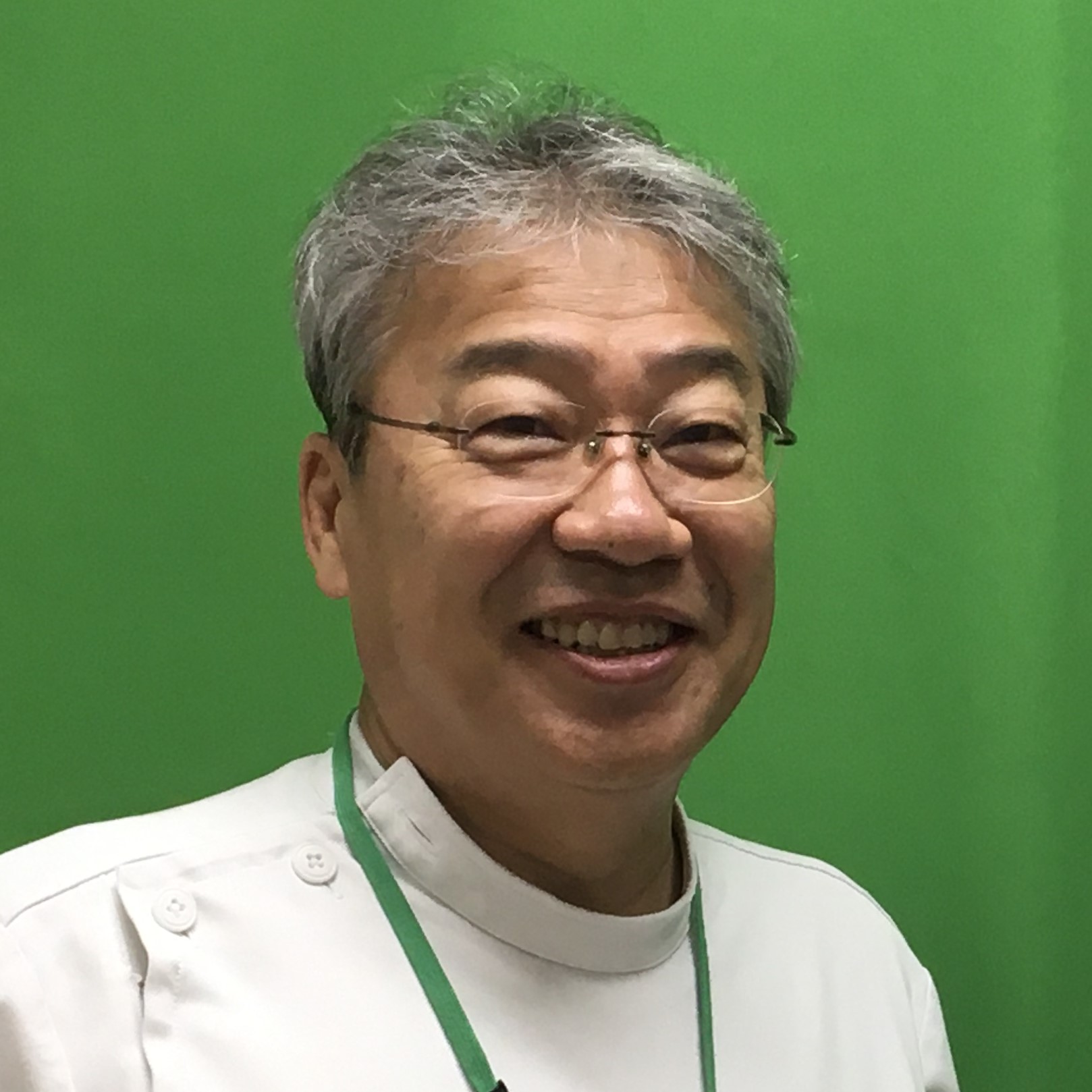 大腸CTに関する研究を行う福島県立医科大学の教授、遠藤俊吾氏の笑顔のポートレート。