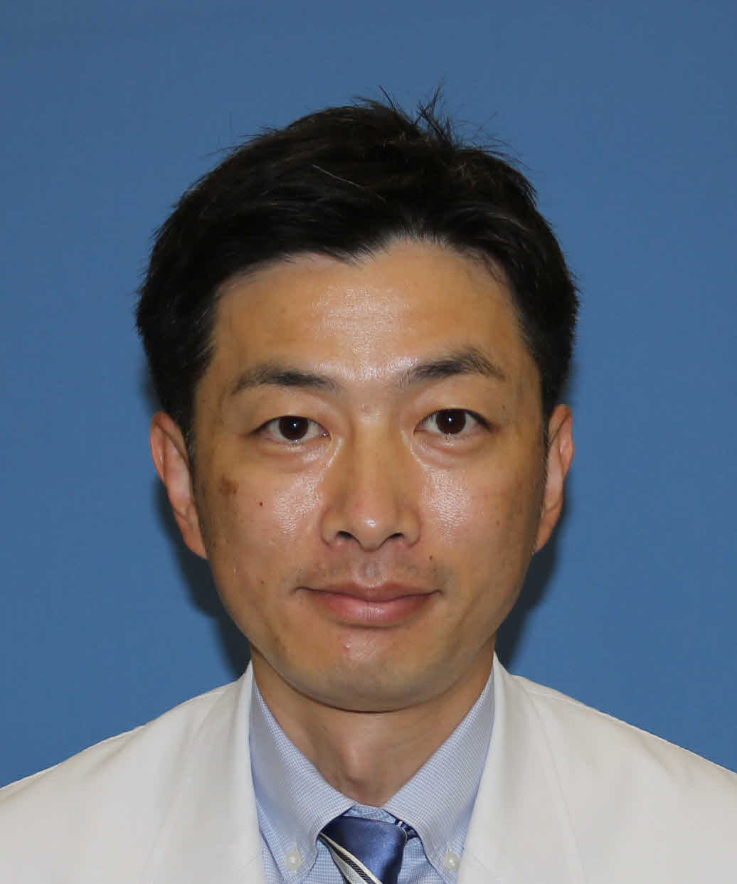 福島県立医科大学の准教授、門馬智之氏のポートレート。