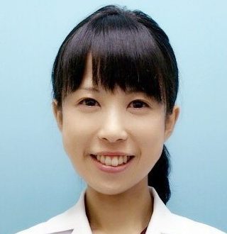 心不全患者の研究に従事する菅原由紀子さんの笑顔のポートレート。
